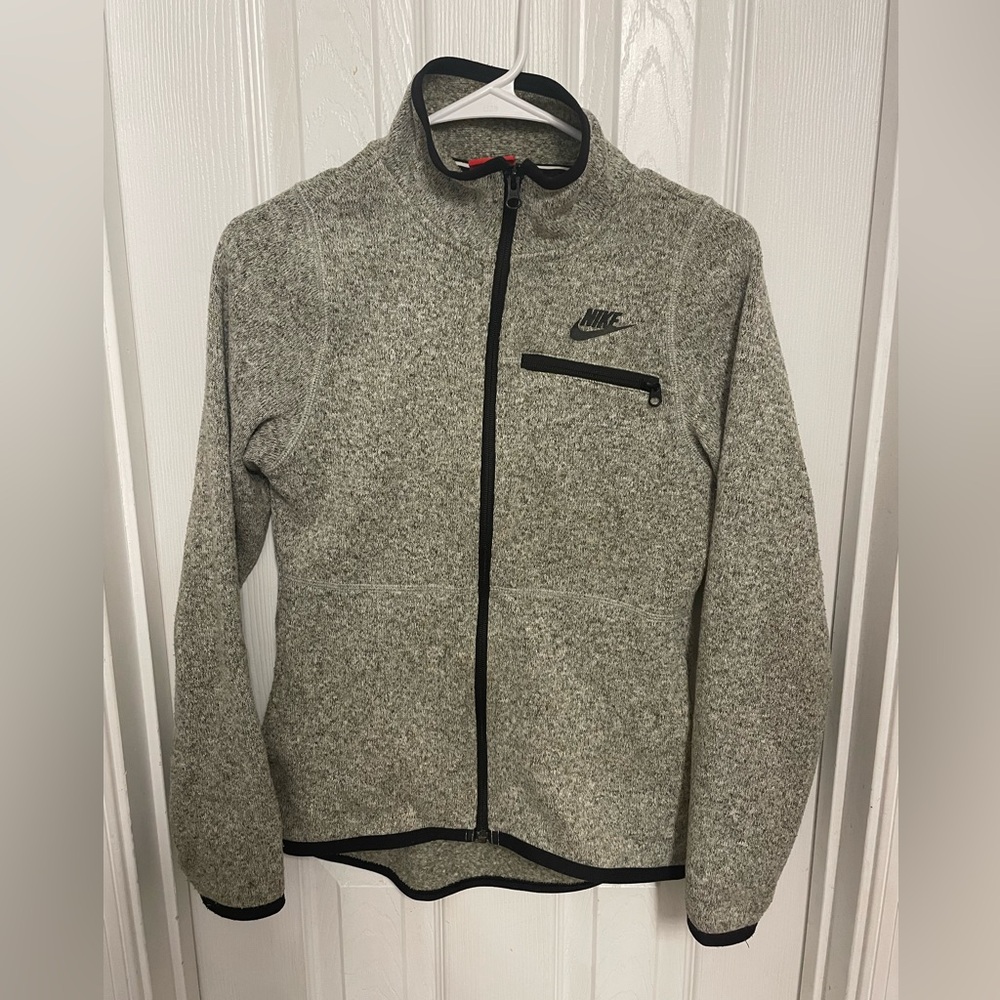 Nike jacket 
Grey with hints of black and green